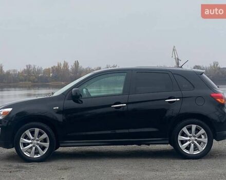 Чорний Міцубісі Аутлендер, об'ємом двигуна 2 л та пробігом 250 тис. км за 10800 $, фото 7 на Automoto.ua