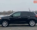 Чорний Міцубісі Аутлендер, об'ємом двигуна 2 л та пробігом 250 тис. км за 10800 $, фото 7 на Automoto.ua