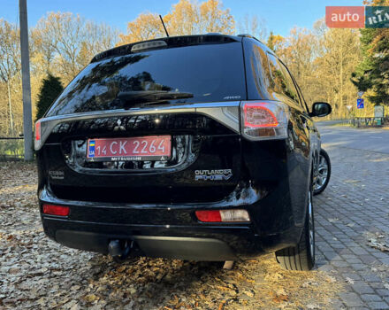 Чорний Міцубісі Аутлендер, об'ємом двигуна 2 л та пробігом 173 тис. км за 15299 $, фото 49 на Automoto.ua