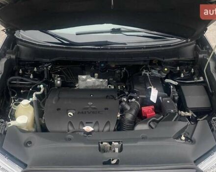 Чорний Міцубісі Аутлендер, об'ємом двигуна 2 л та пробігом 250 тис. км за 10800 $, фото 22 на Automoto.ua