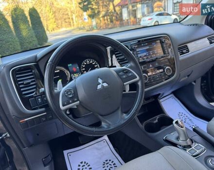 Чорний Міцубісі Аутлендер, об'ємом двигуна 2 л та пробігом 173 тис. км за 15299 $, фото 84 на Automoto.ua