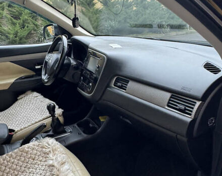 Черный Мицубиси Аутлендер, объемом двигателя 2.27 л и пробегом 244 тыс. км за 14000 $, фото 18 на Automoto.ua