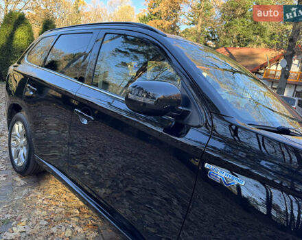 Чорний Міцубісі Аутлендер, об'ємом двигуна 2 л та пробігом 173 тис. км за 15299 $, фото 17 на Automoto.ua