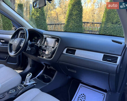 Чорний Міцубісі Аутлендер, об'ємом двигуна 2 л та пробігом 173 тис. км за 15299 $, фото 102 на Automoto.ua