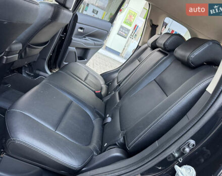 Чорний Міцубісі Аутлендер, об'ємом двигуна 2 л та пробігом 157 тис. км за 15299 $, фото 94 на Automoto.ua