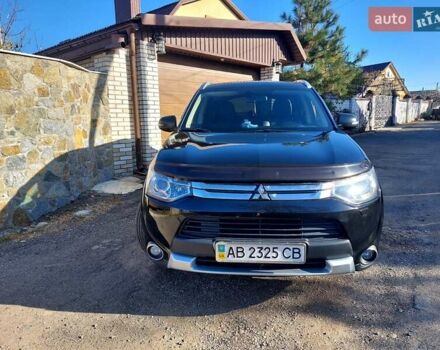 Черный Мицубиси Аутлендер, объемом двигателя 2.4 л и пробегом 183 тыс. км за 15000 $, фото 7 на Automoto.ua