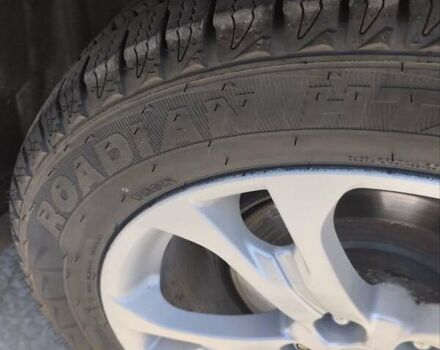 Черный Мицубиси Аутлендер, объемом двигателя 2.42 л и пробегом 148 тыс. км за 13000 $, фото 6 на Automoto.ua