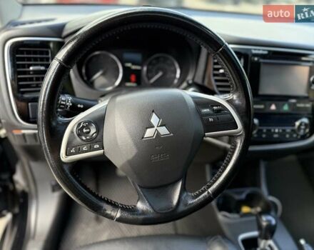 Черный Мицубиси Аутлендер, объемом двигателя 2.4 л и пробегом 231 тыс. км за 12600 $, фото 16 на Automoto.ua