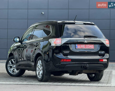 Чорний Міцубісі Аутлендер, об'ємом двигуна 2 л та пробігом 157 тис. км за 15299 $, фото 52 на Automoto.ua