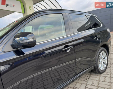 Чорний Міцубісі Аутлендер, об'ємом двигуна 2 л та пробігом 157 тис. км за 15299 $, фото 34 на Automoto.ua