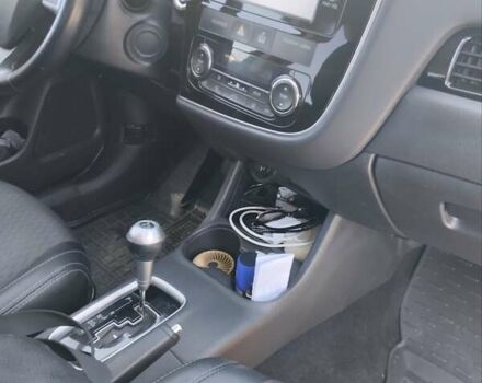 Черный Мицубиси Аутлендер, объемом двигателя 2.42 л и пробегом 148 тыс. км за 13000 $, фото 13 на Automoto.ua