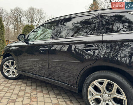 Черный Мицубиси Аутлендер, объемом двигателя 2 л и пробегом 173 тыс. км за 15299 $, фото 62 на Automoto.ua