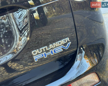 Чорний Міцубісі Аутлендер, об'ємом двигуна 2 л та пробігом 173 тис. км за 15299 $, фото 52 на Automoto.ua