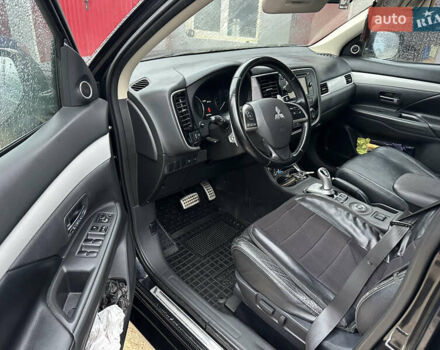 Черный Мицубиси Аутлендер, объемом двигателя 2 л и пробегом 223 тыс. км за 13400 $, фото 9 на Automoto.ua