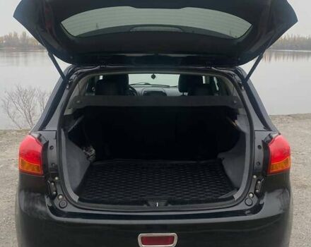 Чорний Міцубісі Аутлендер, об'ємом двигуна 2 л та пробігом 250 тис. км за 10800 $, фото 19 на Automoto.ua