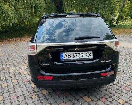 Чорний Міцубісі Аутлендер, об'ємом двигуна 2.36 л та пробігом 275 тис. км за 11700 $, фото 8 на Automoto.ua
