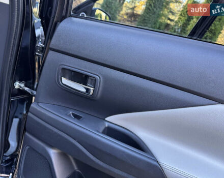 Чорний Міцубісі Аутлендер, об'ємом двигуна 2 л та пробігом 173 тис. км за 15299 $, фото 116 на Automoto.ua