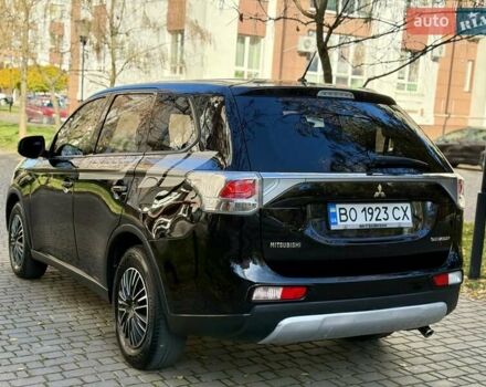 Черный Мицубиси Аутлендер, объемом двигателя 2.4 л и пробегом 270 тыс. км за 12500 $, фото 9 на Automoto.ua