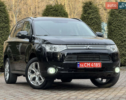 Черный Мицубиси Аутлендер, объемом двигателя 2 л и пробегом 173 тыс. км за 15299 $, фото 2 на Automoto.ua