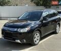 Черный Мицубиси Аутлендер, объемом двигателя 2.4 л и пробегом 231 тыс. км за 12600 $, фото 6 на Automoto.ua