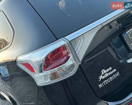 Чорний Міцубісі Аутлендер, об'ємом двигуна 2.4 л та пробігом 199 тис. км за 12800 $, фото 9 на Automoto.ua