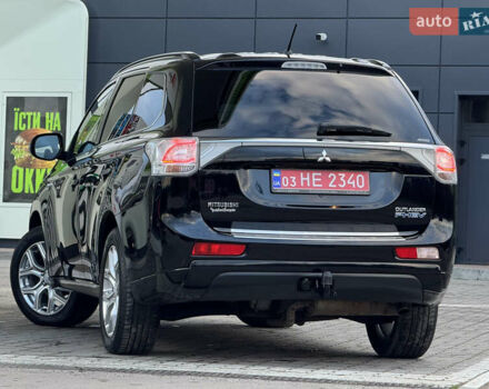 Чорний Міцубісі Аутлендер, об'ємом двигуна 2 л та пробігом 157 тис. км за 15299 $, фото 53 на Automoto.ua