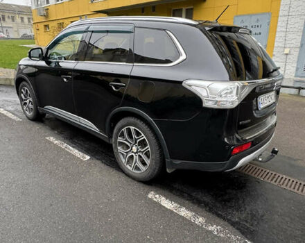 Черный Мицубиси Аутлендер, объемом двигателя 2.27 л и пробегом 244 тыс. км за 14000 $, фото 9 на Automoto.ua