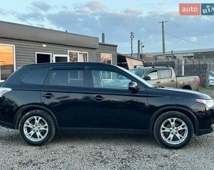 Чорний Міцубісі Аутлендер, об'ємом двигуна 2.4 л та пробігом 199 тис. км за 12800 $, фото 2 на Automoto.ua