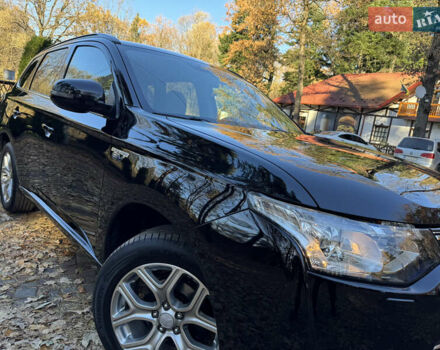 Чорний Міцубісі Аутлендер, об'ємом двигуна 2 л та пробігом 173 тис. км за 15299 $, фото 12 на Automoto.ua