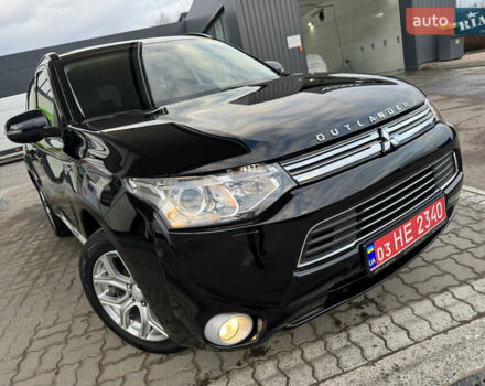 Чорний Міцубісі Аутлендер, об'ємом двигуна 2 л та пробігом 157 тис. км за 15299 $, фото 9 на Automoto.ua