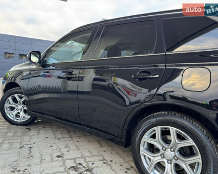 Чорний Міцубісі Аутлендер, об'ємом двигуна 2 л та пробігом 157 тис. км за 15299 $, фото 64 на Automoto.ua