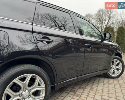 Черный Мицубиси Аутлендер, объемом двигателя 2 л и пробегом 173 тыс. км за 15299 $, фото 46 на Automoto.ua
