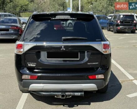 Черный Мицубиси Аутлендер, объемом двигателя 2.4 л и пробегом 231 тыс. км за 12600 $, фото 3 на Automoto.ua