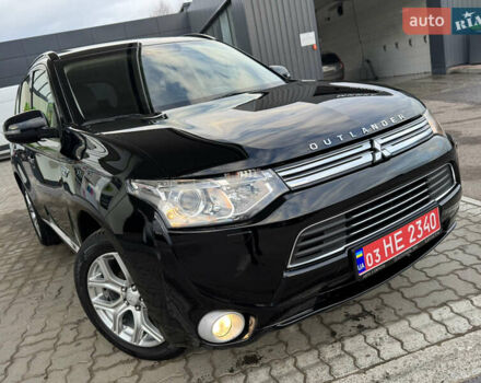 Чорний Міцубісі Аутлендер, об'ємом двигуна 2 л та пробігом 157 тис. км за 15299 $, фото 5 на Automoto.ua