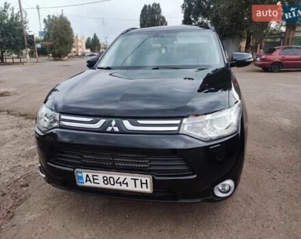 Черный Мицубиси Аутлендер, объемом двигателя 2.4 л и пробегом 220 тыс. км за 13400 $, фото 2 на Automoto.ua