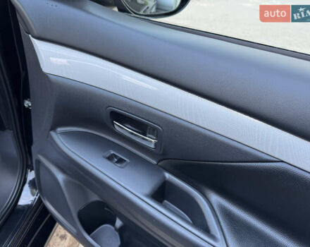 Чорний Міцубісі Аутлендер, об'ємом двигуна 2 л та пробігом 157 тис. км за 15299 $, фото 82 на Automoto.ua