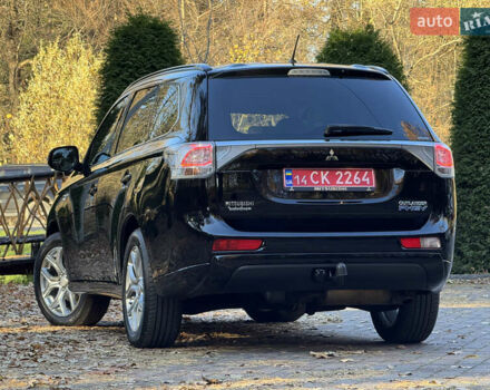 Чорний Міцубісі Аутлендер, об'ємом двигуна 2 л та пробігом 173 тис. км за 15299 $, фото 61 на Automoto.ua