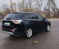 Чорний Міцубісі Аутлендер, об'ємом двигуна 2.4 л та пробігом 224 тис. км за 12000 $, фото 4 на Automoto.ua