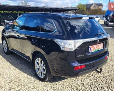 Чорний Міцубісі Аутлендер, об'ємом двигуна 2 л та пробігом 237 тис. км за 13800 $, фото 3 на Automoto.ua