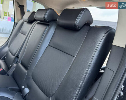 Чорний Міцубісі Аутлендер, об'ємом двигуна 2 л та пробігом 157 тис. км за 15299 $, фото 96 на Automoto.ua