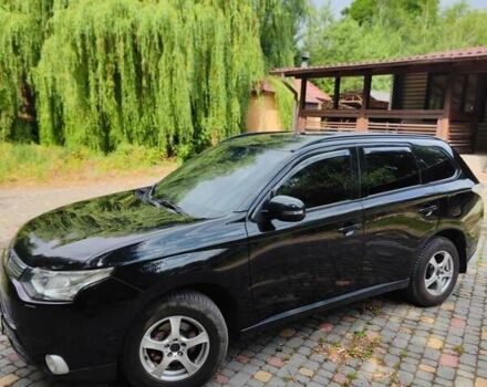 Чорний Міцубісі Аутлендер, об'ємом двигуна 2.36 л та пробігом 275 тис. км за 11700 $, фото 9 на Automoto.ua