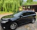Чорний Міцубісі Аутлендер, об'ємом двигуна 2.36 л та пробігом 275 тис. км за 11700 $, фото 9 на Automoto.ua