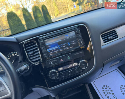 Чорний Міцубісі Аутлендер, об'ємом двигуна 2 л та пробігом 173 тис. км за 15299 $, фото 89 на Automoto.ua