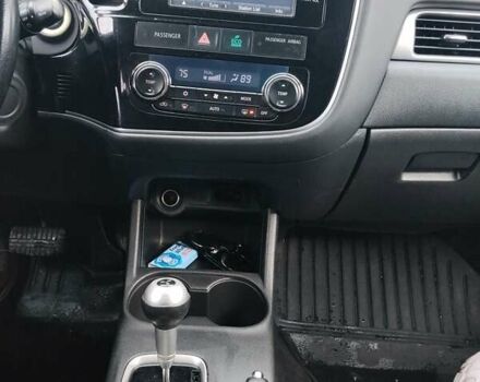 Чорний Міцубісі Аутлендер, об'ємом двигуна 2.4 л та пробігом 224 тис. км за 12000 $, фото 16 на Automoto.ua