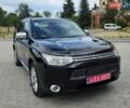 Черный Мицубиси Аутлендер, объемом двигателя 2 л и пробегом 264 тыс. км за 13300 $, фото 1 на Automoto.ua