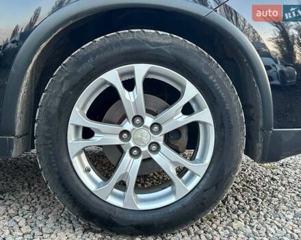 Чорний Міцубісі Аутлендер, об'ємом двигуна 2.4 л та пробігом 199 тис. км за 12800 $, фото 34 на Automoto.ua