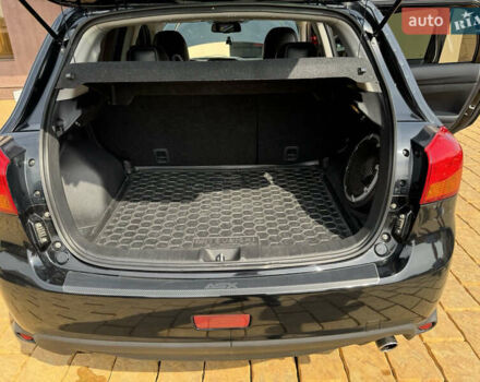 Чорний Міцубісі Аутлендер, об'ємом двигуна 2 л та пробігом 211 тис. км за 9500 $, фото 8 на Automoto.ua