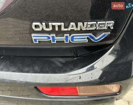 Черный Мицубиси Аутлендер, объемом двигателя 2 л и пробегом 223 тыс. км за 13400 $, фото 8 на Automoto.ua