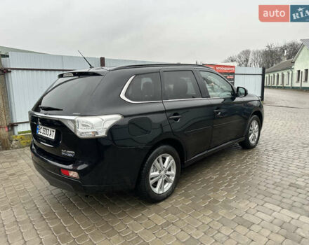 Черный Мицубиси Аутлендер, объемом двигателя 2 л и пробегом 223 тыс. км за 13400 $, фото 5 на Automoto.ua