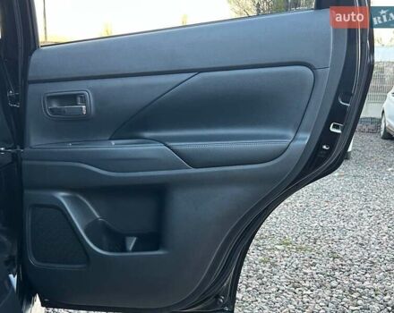 Чорний Міцубісі Аутлендер, об'ємом двигуна 2.4 л та пробігом 199 тис. км за 12800 $, фото 30 на Automoto.ua